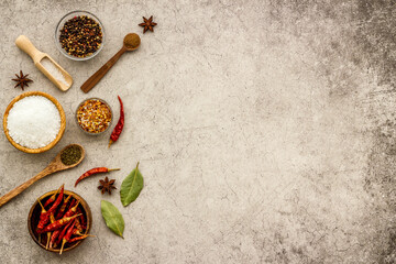 Powdered spices and herbs in bowls. Colorful cooking background