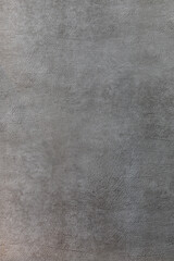 Fototapeta na wymiar Gray leather texture on the wall. The background