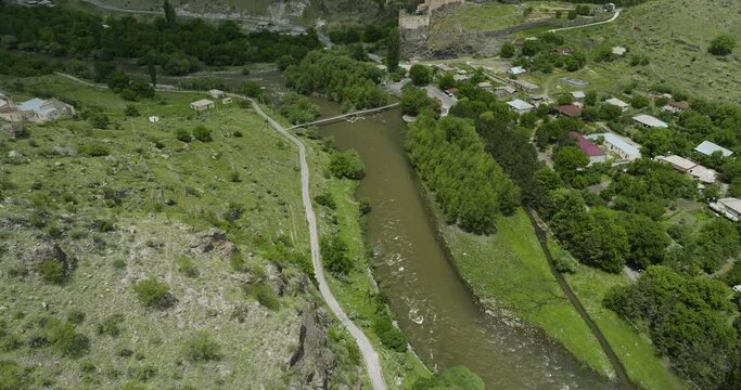 Flowing Waters Of Paravani River Near Khertvisi In Georgia. aerial drone