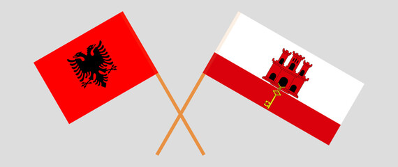 Crossed flags of Albania and Gibraltar. Official colors. Correct proportion
