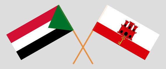 Crossed flags of the Sudan and Gibraltar. Official colors. Correct proportion