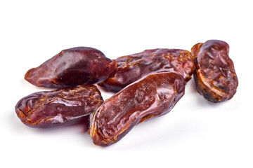 Dried dates, isolated on white background.