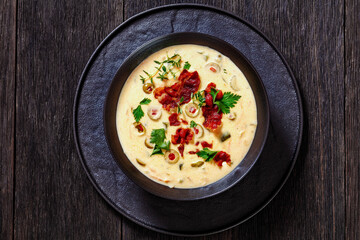 Beer cheese soup in bowl, top view