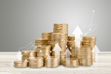 stack of coins with trading chart in financial concepts and financial investment business stock...