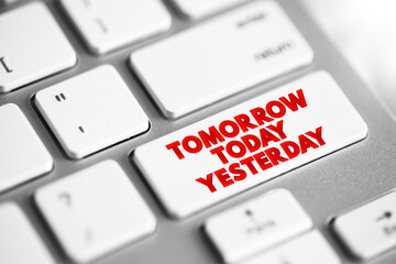 Tomorrow Today Yesterday text button on keyboard, concept background