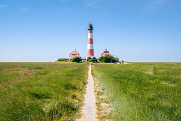 Pathway leading to the Westerheversand lighthouse, Westerhever, Schleswig-Holstein, Germany