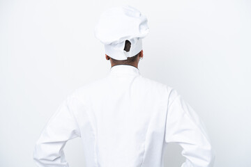 Young Brazilian chef man isolated on white background in back position