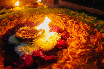 Traditional Indian Petal Decoration  For Event. Candle Light and Flowers and Oil Candle lamp. Indian Culture Festival Decoration.