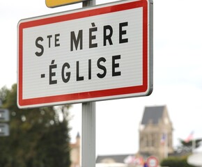 sign with the words STE MERE EGLISE in FRANCE  indicating a place of the D-DAY D-DAY landing in WWII