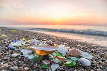 Sea glass, Pieces of sea glass isolated on white background, Green pieces of glass polished by the sea closeup background. A pile of natural beach glass, Multi colored pieces of polished glass.