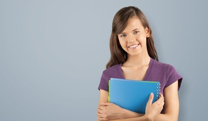 Happy smiling student or teacher. Student education in high school university college concept. Happy young girl holding notes