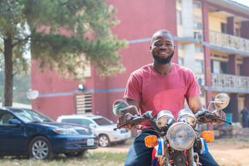 young african bike rider smiling