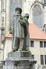 Fototapeta na wymiar Münster September 2021: Fountain at the Prinzipalmarkt in Munster