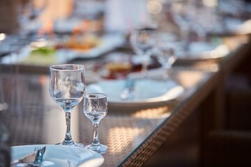 Crystal glasses for newlyweds wedding, decorated for the holiday.