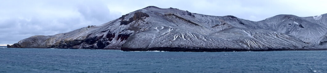 Panorama of snow covered mountains at Deception Island, Antarctica