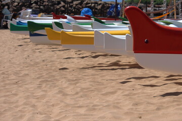 Hawaiian canoes laying on Porto beach, Fernando de Noronha