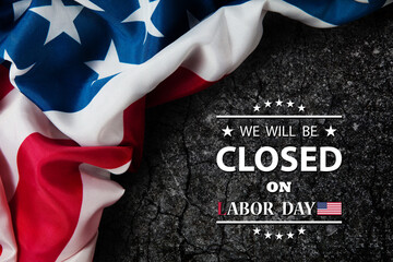 Labor Day Background Design. American flag on stone wall with a message. We will be Closed on Labor Day.