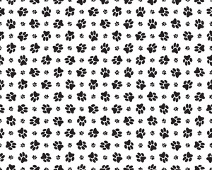 Seamless pattern of print of dogs paws on a white background