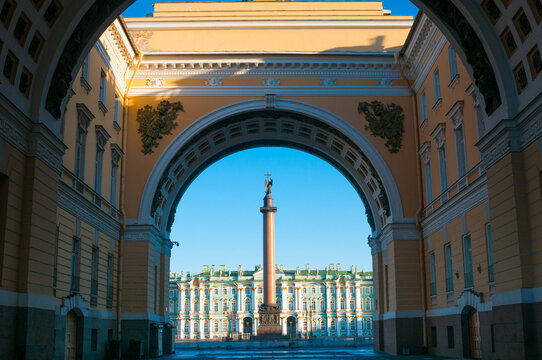 Alexandrian column and Winter Palace on the Palace Square in St. Petersburg, Russia. View through the arch of the General Staff
