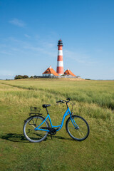 Bicycle tour to the Westerheversand Lighthouse, Westerhever, Nordfriesland, Schleswig-Holstein, Germany	