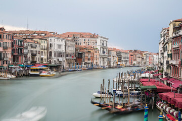 Fototapeta na wymiar Long exposure of Grand Canal in Venice, Italy from Rialto