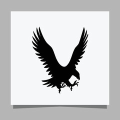 Vector illustration of a black eagle on white paper which is perfect for logos, business cards, emblems and icons
