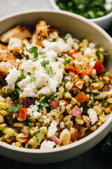 Mexican Street Corn Salad Closeup with Grilled Chicken