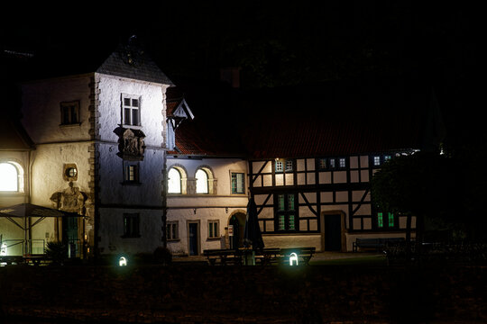 Dortmund, Germany - 08 24 2022 - night view of Moated castle Haus Rodenberg in Aplerbeck, North Rhine Westphalia
