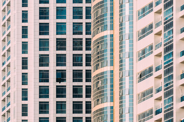Fototapeta premium Wall With A Balcony Of New Empty Modern Multi-storey Residential Building House In Residential Area.