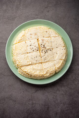 Kharvas or Cheek, Chik, Bari, Pis or Junnu is a sweet dairy product made from bovine colostrum