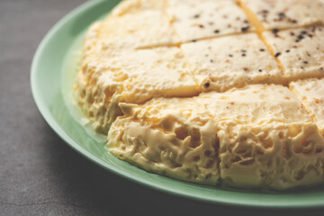 Kharvas or Cheek, Chik, Bari, Pis or Junnu is a sweet dairy product made from bovine colostrum