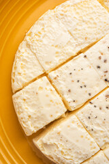 Kharvas or Cheek, Chik, Bari, Pis or Junnu is a sweet dairy product made from bovine colostrum