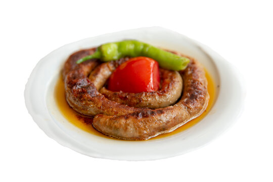 Traditional delicious Turkish cuisine, Middle Eastern dishes, offal dishes, stuffed sheep intestines (Turkish name; Mumbar dolmasi) stock photo