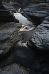 Slate and stream at Trebarwith Strand Cornwall