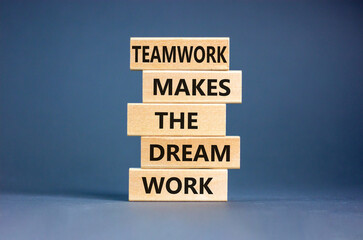 Teamwork makes the dream work symbol. Concept words Teamwork makes the dream work on wooden blocks...