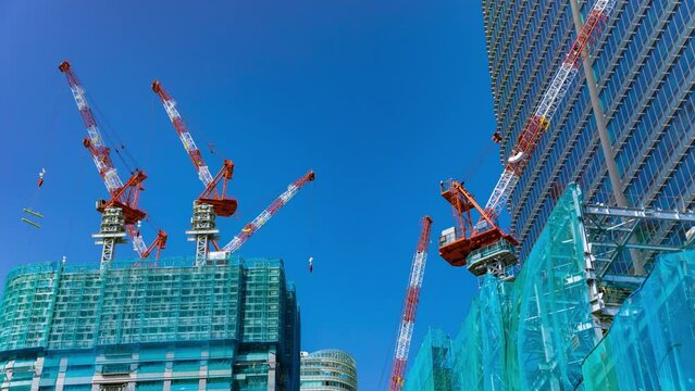 A timelapse of crane at the under construction daytime