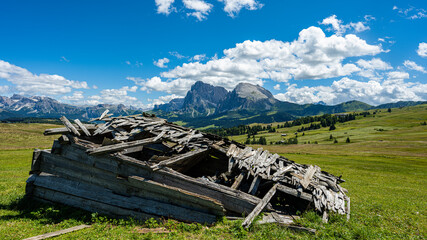 Collapsed hut in the Alps, Alpe di Siusi, Castelrotto Sud Tyrol.summer 2021
