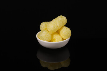 Sweet corn sticks in a bowl. Shallow depth of field