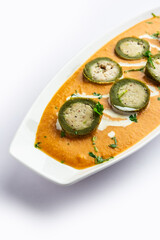 Shaam Savera is a spinach kofta curry where stuffing is made from paneer and the kofta made from spinach