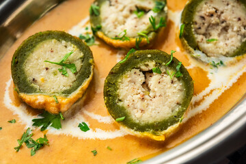 Shaam Savera is a spinach kofta curry where stuffing is made from paneer and the kofta made from spinach