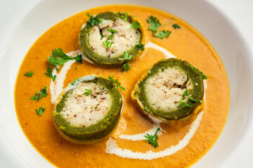 Shaam Savera is a spinach kofta curry where stuffing is made from paneer and the kofta made from spinach