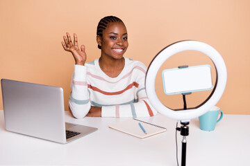 Photo of funky young brunette lady talk blog wear striped pullover isolated on beige color background