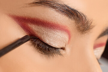 Naklejka premium Macro close up of eyeliner brush, make up concept.