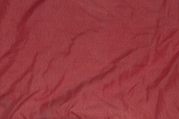 red crumpled fabric texture background