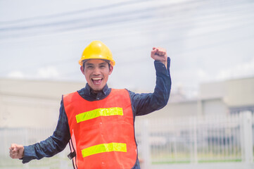 Asian Engineer standing outdoor on site construction posting confident , Engineer construction happy job success with in target planning