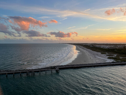 An Aerial View Of  Port Canaveral At Sunset During A Cruise Ship Sail Away In Orlando, Florida.