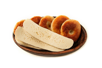 Mchadi, corn tortillas, traditional Georgian dish, corn bread, with Imeretian cheese, homemade, no people, on a light background,