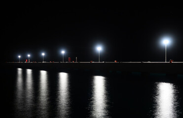 Fototapeta premium night view of a pier -1