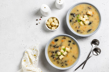 Vegan gluten free coconut milk mushroom soup. Top view, copy space.