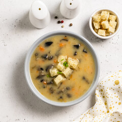 Roasted potato garlic creamy mushroom soup. Top view, copy space.